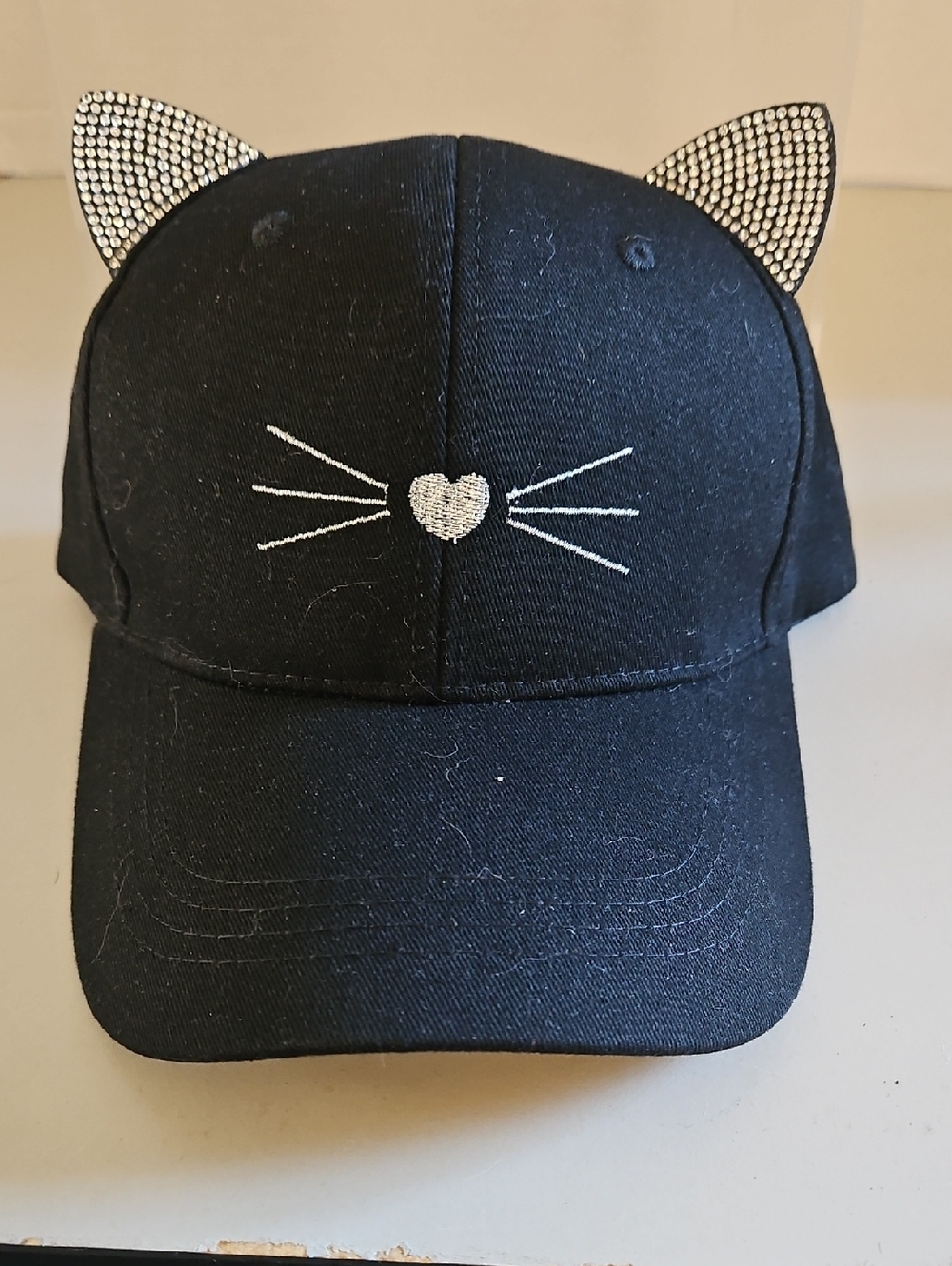 David and Young Black Cat Ear Cap with Rhinestone Accents